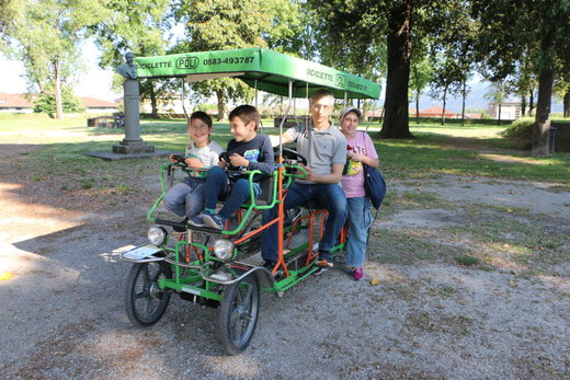 The most fun thing to do in Lucca? Riding along the city walls in a surrey!