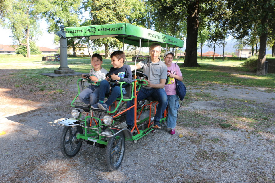 The most fun thing to do in Lucca? Riding along the city walls in a surrey!