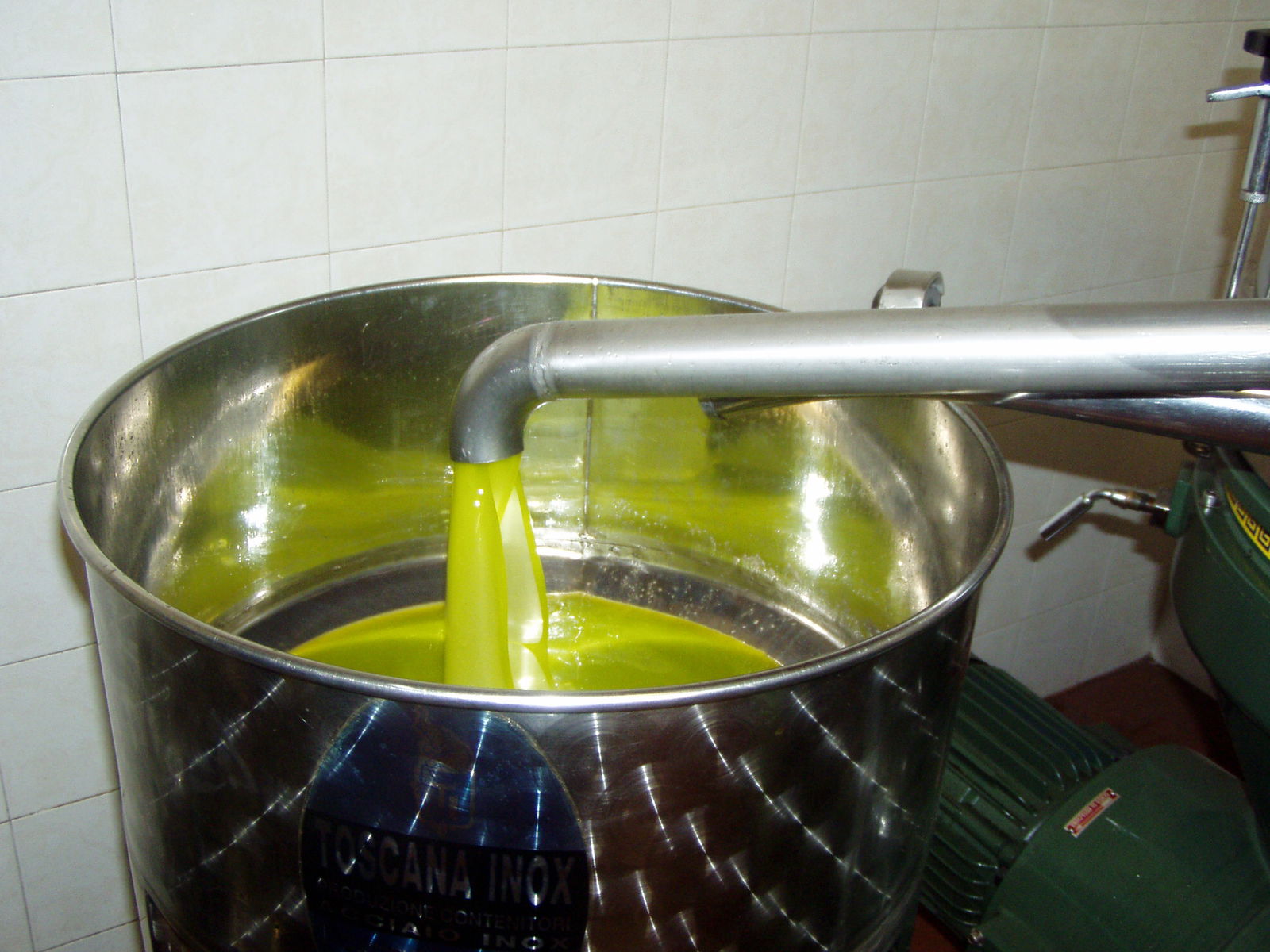 The new olive oil, perfect when pured on a roasted slice of bred and served with a glass of red wine.